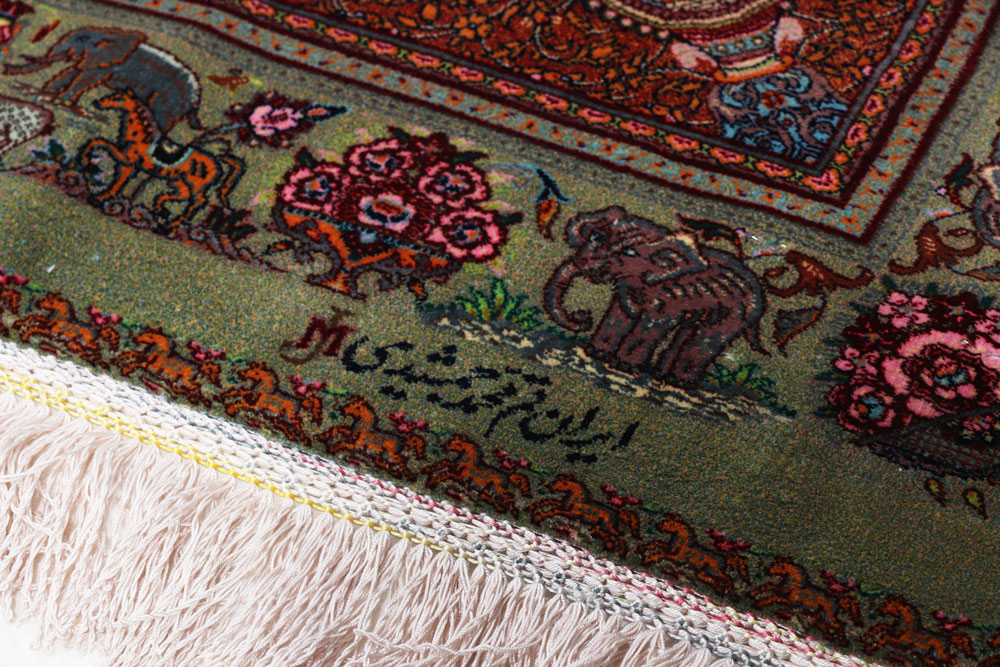 Signature of the master knotter Jamshidi on a silk rug